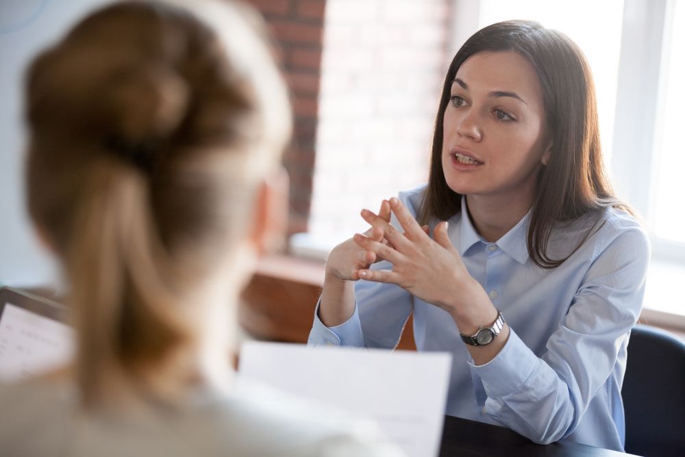 Woman speaking to her personal injury lawyer