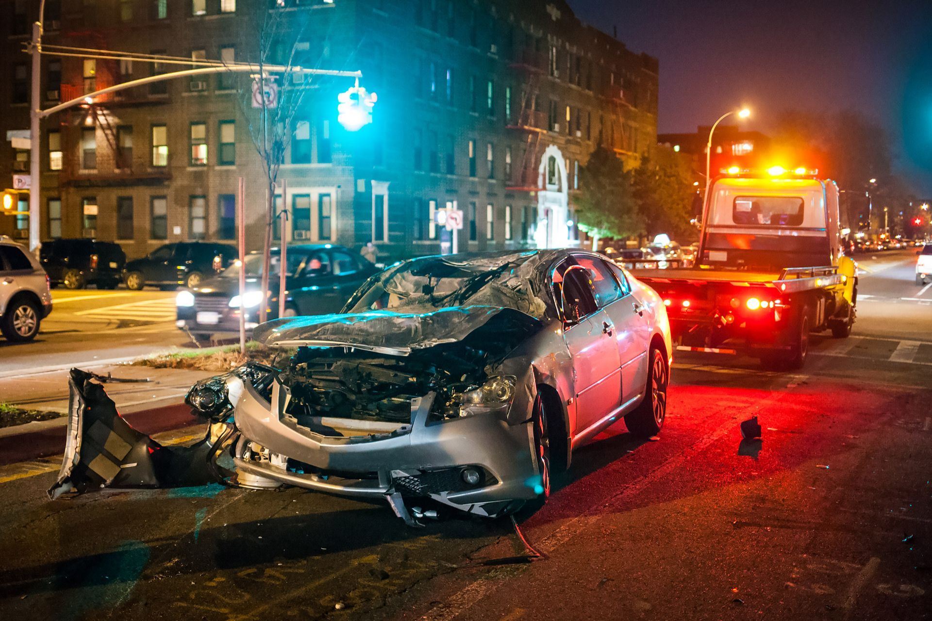 Car crash in Dallas at night with city rescue emergency service