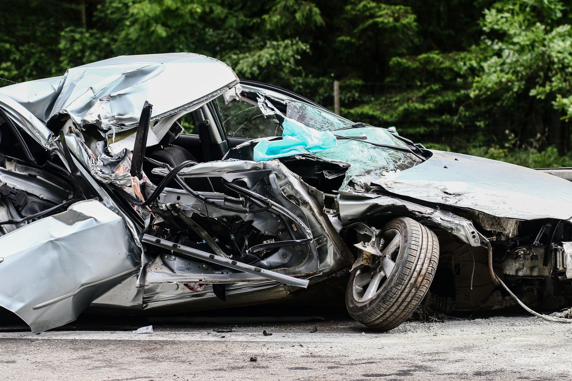 A damaged car after an auto accident in Dallas TX