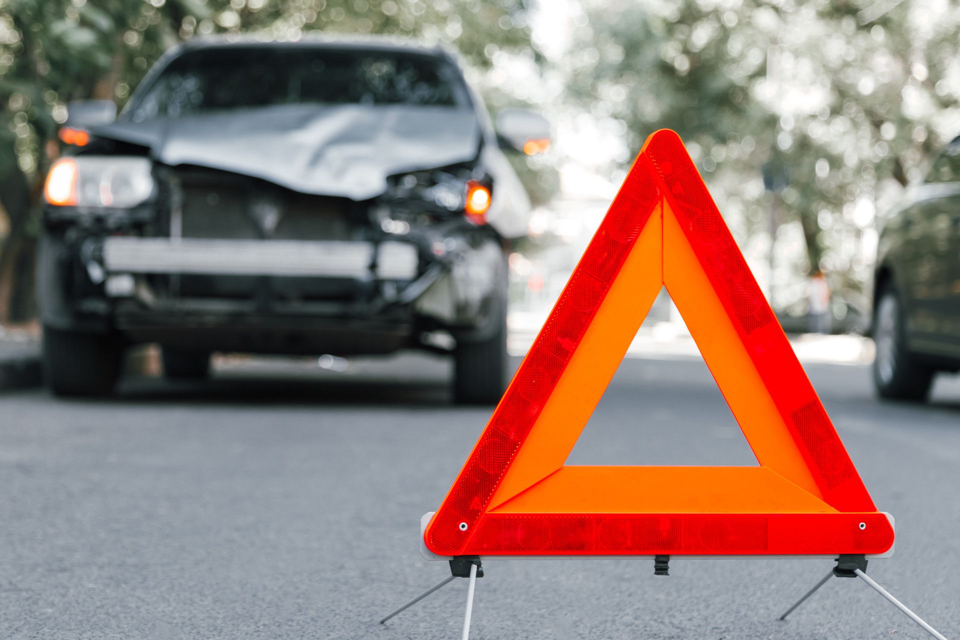 Emergency stop triangle sign at a car accident in Dallas