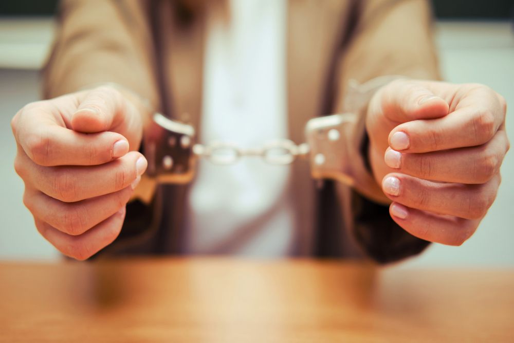 Woman in Handcuffs After DUI