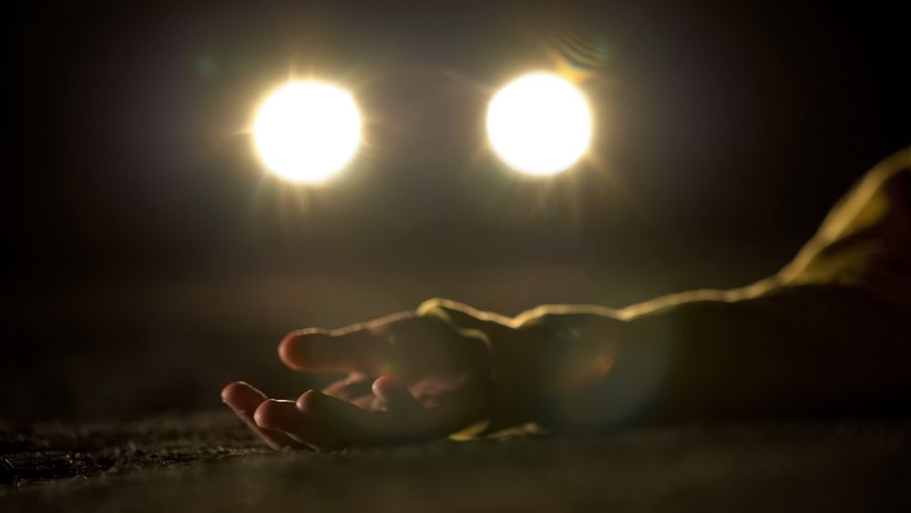 Man in the road after pedestrian accident