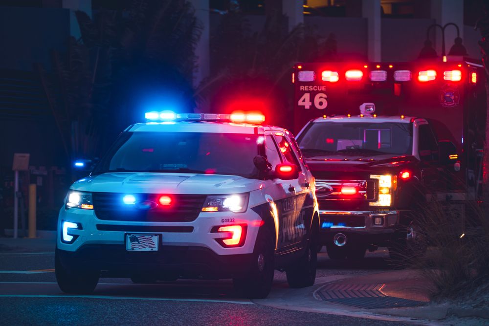 Police and emergency services arrive at the site of a truck accident