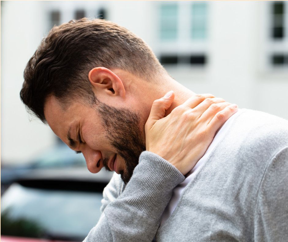 man suffering from bulging disc after car accident